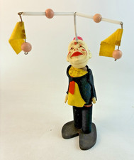 Vintage Wind-Up Juggling Clown Toy with Composition Head and Cloth Body