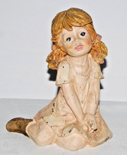 Resin Figurine of Young Girl in Red Dress Holding Doll and Quilt — listing 3