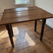 Antique Walnut Drop-Leaf Table with Turned Legs and Storage Compartment — listing 4