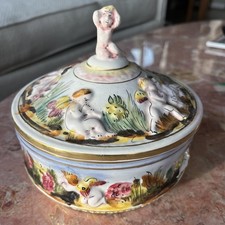Pair of Italian Capodimonte-Style Covered Urns with Figural Cherub Finials and Relief Putti Scenes — listing 5