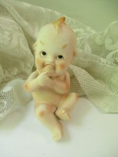 Pair of Mid-Century Ceramic Pouty Boy and Girl Figurines with Gold Trim — listing 6