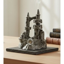 Pewter Castle/Tower Figurine with Faceted Crystal Point Spire Yes - there is text/logo on the bottom