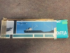 Display Case of Assorted Decorative Collectibles (Model Ship, Woven Baskets, Model Bicycle, Wooden Flute) — listing 6