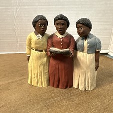 Resin Figurine of Seated African American Girl Holding Baby Doll — listing 4