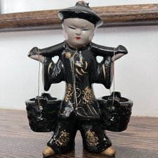 Ceramic Figurine of a Seated Barefoot Man Holding an Apple — listing 6