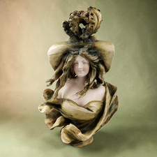 Small Cast Metal Bust of an Art Nouveau Woman with Bonnet