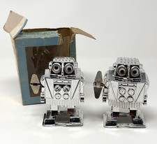 Vintage Wind-Up Walking Space Robot, Cream Plastic with Litho Chest Panel, Made in Hong Kong