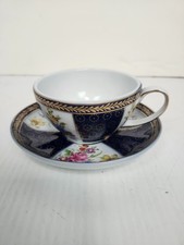 White Porcelain Footed Teacup with Embossed White Scrollwork Border and Platinum Trim — listing 5