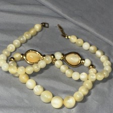Vintage Cream Lucite Graduated Bead Necklace with Gold-Tone Spacers
