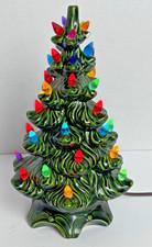 Ceramic Light-Up Christmas Tree with Train Base and Candy Cane Ornaments Yes - a paper sticker or brand name — listing 4