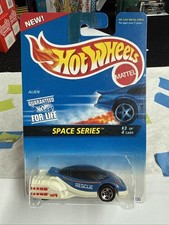 Vintage Die-Cast Alien/Creature-Themed Fantasy Toy Car with Gold Accents