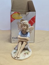 Porcelain Fairy Figurine Seated on Pink Lotus Flower with Green Butterfly Wings — listing 4