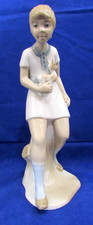 Porcelain Figurine of Girl in Flowered Hat with Puppy and Flowers — listing 5