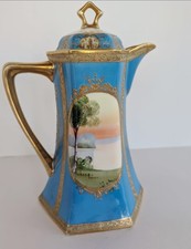 Antique Hand-Painted Porcelain Chocolate Set with Orchid/Lily Motif and Heavy Gold Trim