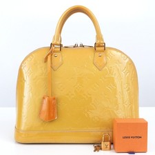 Louis Vuitton Alma PM Monogram Canvas Handbag with Vachetta Leather Trim — listing 6