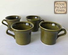 Set of 8 Mid-Century Avocado Green Ceramic Coffee Mugs with White Interior — listing 4