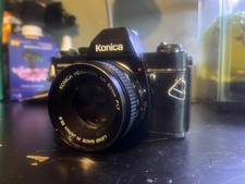 Konica 35mm SLR Film Camera with Konica Hexanon Lens and Leather Case