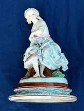 Vintage Bisque Porcelain Figurine of Seated Woman in Plumed Hat with Raised Leg — listing 6