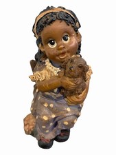 Resin Figurine of Seated African American Girl Holding Baby Doll — listing 3