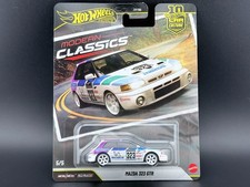 Hot Wheels Mazda RX-7 (FD) Die-Cast Car with Mazdaspeed Livery, Orange