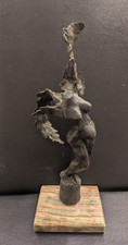 Bronze-Finish Sculpture of a Standing Female Nude Dancer, Arms Raised Overhead — listing 4