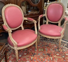 Pair of Louis XV Style Carved Walnut Fauteuils with Caned Backs and Tufted Upholstered Seats
