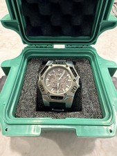 Black-Tone Skeleton Automatic Wristwatch with Gold Movement and Tachymeter Bezel — listing 6