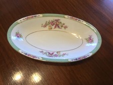 Czechoslovakian Porcelain Oval Handled Relish Dish with Floral Garland Border — listing 4