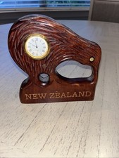 New Zealand Rimu Wood Slab Wall Clock with Paua Shell Inlay and Carved Kiwi