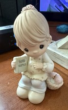 Precious Moments Angel Figurine Holding "Names for Baby" Book