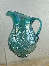Iridescent Green Carnival Glass Tall Pitcher with Floral Relief