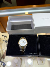 Seiko Two-Tone Quartz Dress Watch, Black Dial with Date, 50M Water Resistant Caseback reads different code