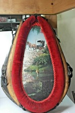 Antique Horse Collar Repurposed into Wall Clock with Green Velvet Face and Brass Numerals