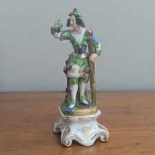 Porcelain figural spill vase with seated boy and rabbits, blue and white with hand-painted floral accents — listing 3
