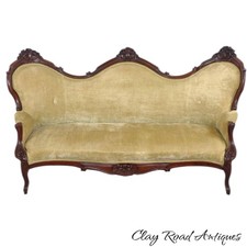 Victorian Rococo Revival Camelback Sofa/Settee with Carved Walnut Frame