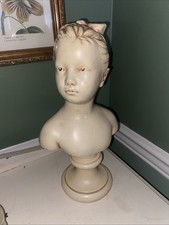 Cast Plaster Sculpture of a Seated Child Holding a Toy Car — listing 5