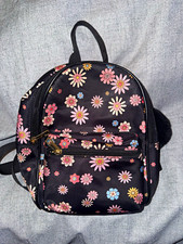 Black Nylon and Faux Leather Flap-Top Mini Backpack with Zip Front Pocket Yes - logo stamped on hardware/zippers