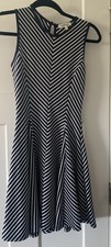 Sleeveless Fit-and-Flare Dress with Red Bodice and Red/White Striped Skirt — listing 4