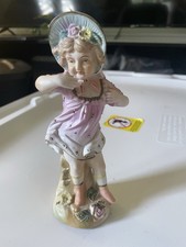 Antique German Bisque Porcelain Figurine of a Girl Holding a Bird — listing 5