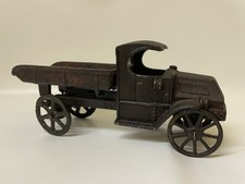 Cast Iron Toy Dump Truck with Nickel Driver and White Rubber Tires — listing 3