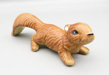 Hand-Painted Ceramic Squirrel Figurine with Blue Floral Motif and Gilt Acorn