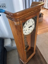 Howard Miller Westminster Chime Wall Clock with Broken-Arch Pediment and Urn Finial Key-wound mechanical — listing 2
