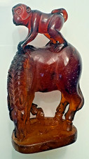 Chinese Carved Cherry Amber (Faux Amber / Bakelite) Figure of an Immortal on Wood Stand — listing 3