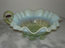 Vaseline / Uranium Glass Nappy Dish with Blue Opalescent Ruffled Rim and Applied Handle — listing 3