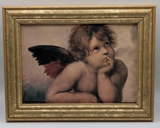 Framed Print of a Sistine Madonna Cherub (Raphael Detail)