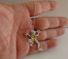 Costume Jewelry Lot: Faux Amber Frog Pendant Necklace on Organza Ribbon Cord and Silver-Tone Flower Hinged Cuff Bracelet with Green & Yellow Cabochons — listing 2