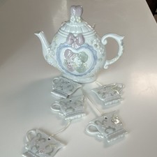 Precious Moments Style Ceramic Teapot with Boy and Girl Relief Design and Heart Finial — listing 3