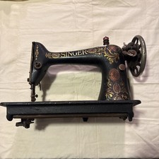 Singer Model 66 Treadle Sewing Machine with Red Eye Decals in Oak Cabinet — listing 4