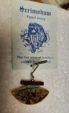 Carved Marine Ivory Scrimshaw Knife with Seal Motif and Figural Seal-Head Handle