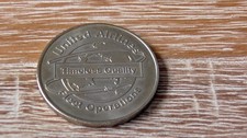 United Airlines Information Security & Compliance Team FOS Challenge Coin — listing 4